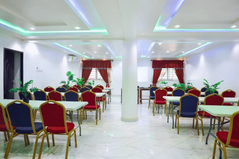 Meeting room seating and tables in the conference hall at Leisure Cozy Hotel, Hohoe